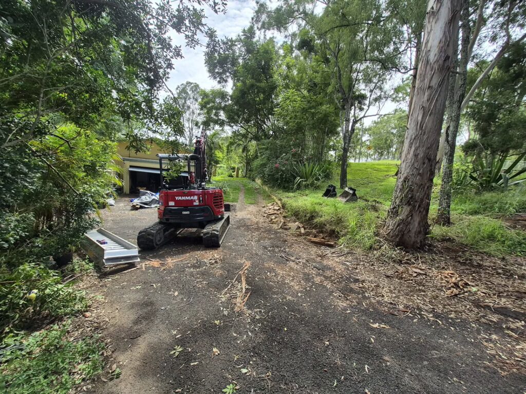 failed brick retaining wall at Pinjarra Hills - before