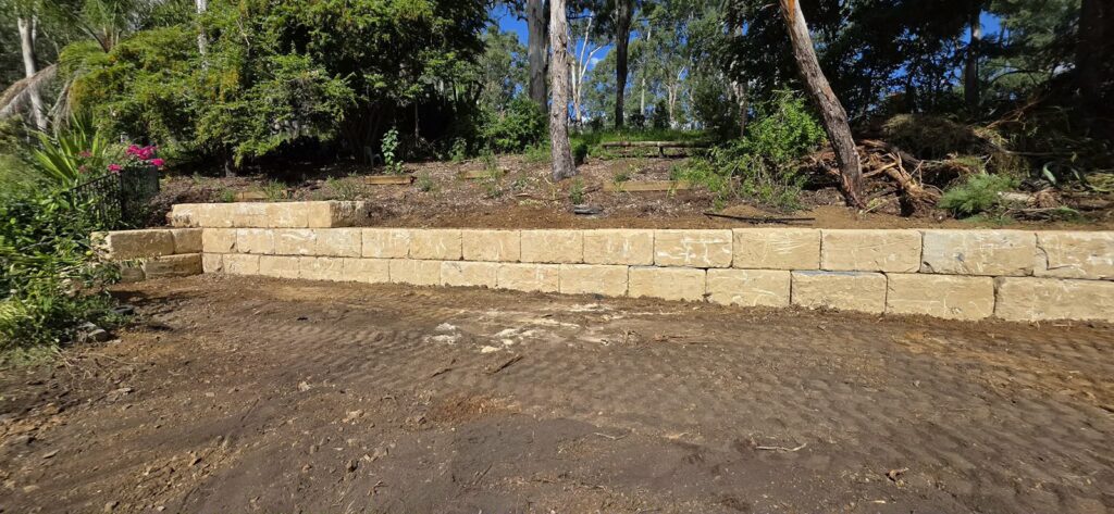 sandstone block retaining wall at Pinjarra Hills
