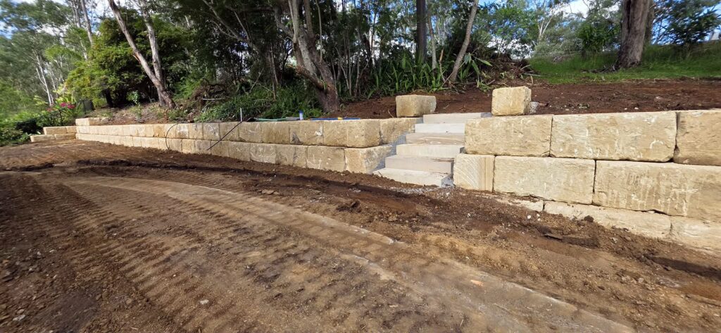 sandstone block retaining wall at Pinjarra Hills