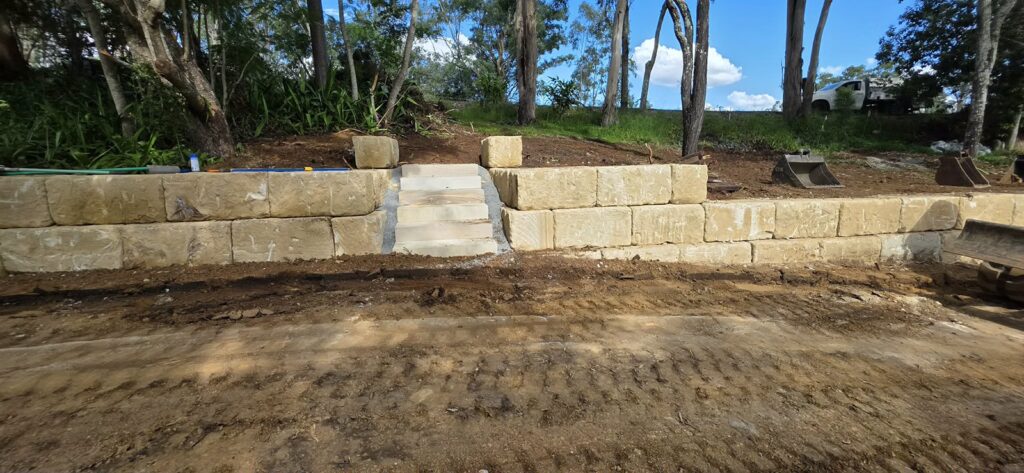 sandstone block retaining wall at Pinjarra Hills